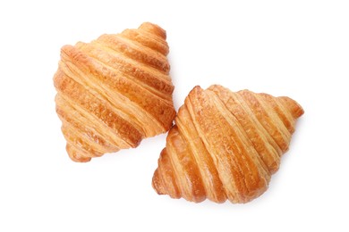 Photo of Delicious croissants isolated on white, top view. Fresh pastries
