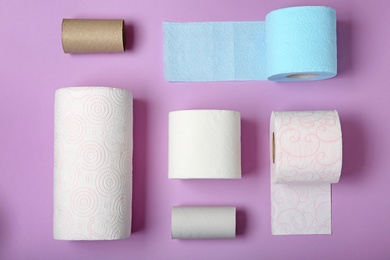 Photo of Flat lay composition with toilet paper on color background