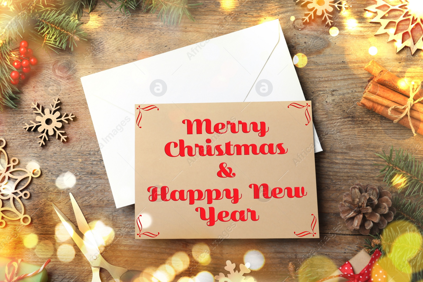 Image of Merry Christmas and Happy New Year. Flat lay composition with greeting card on wooden table