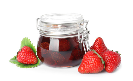 Photo of Delicious pickled strawberry jam and fresh berries isolated on white