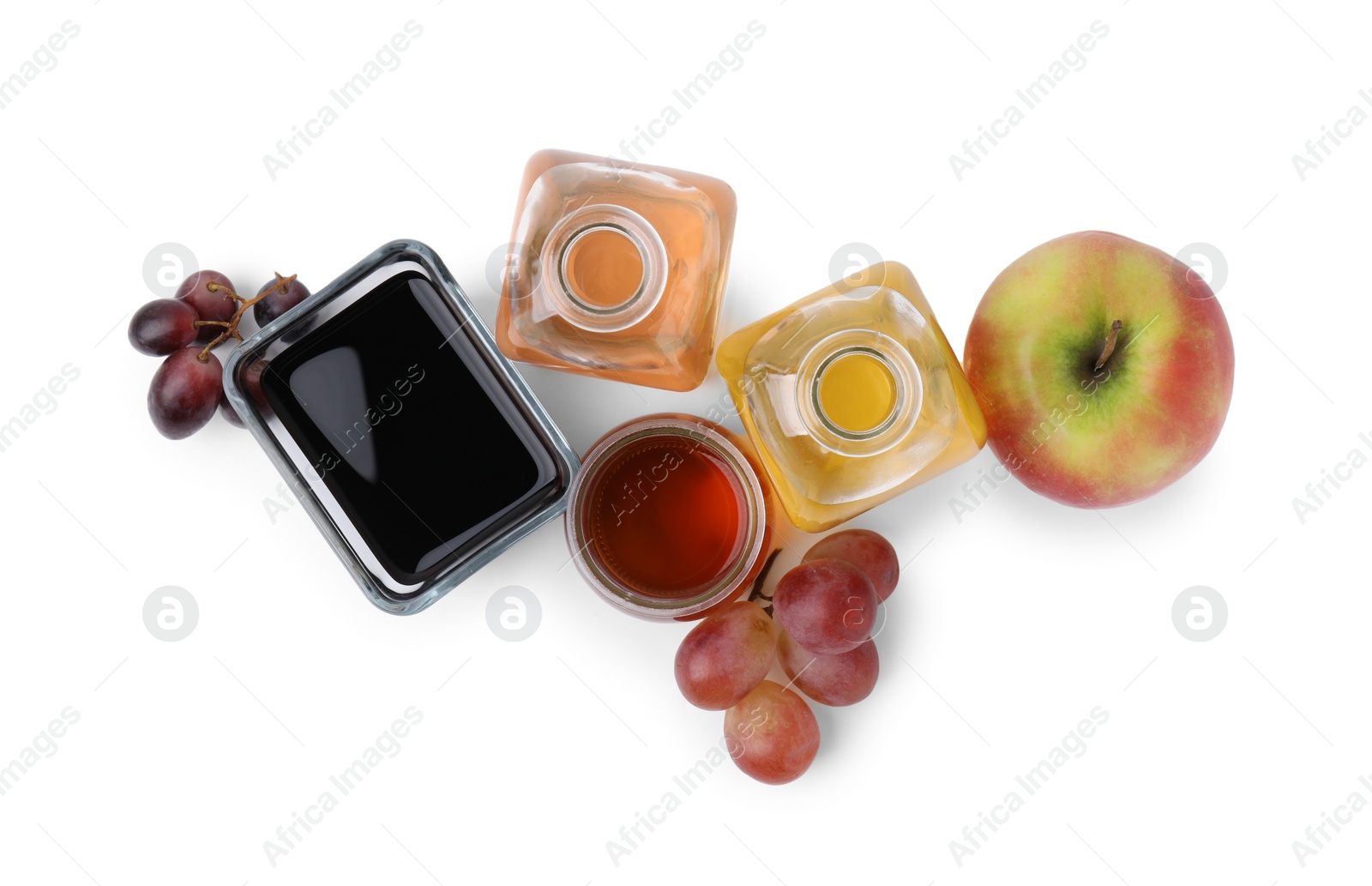 Photo of Different types of vinegar and ingredients isolated on white, top view