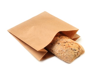 Paper bag with bread on white background. Space for design