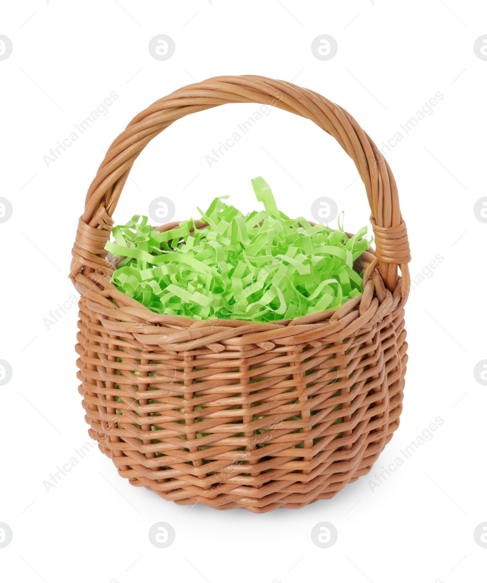 Photo of Easter wicker basket with decorated grass isolated on white