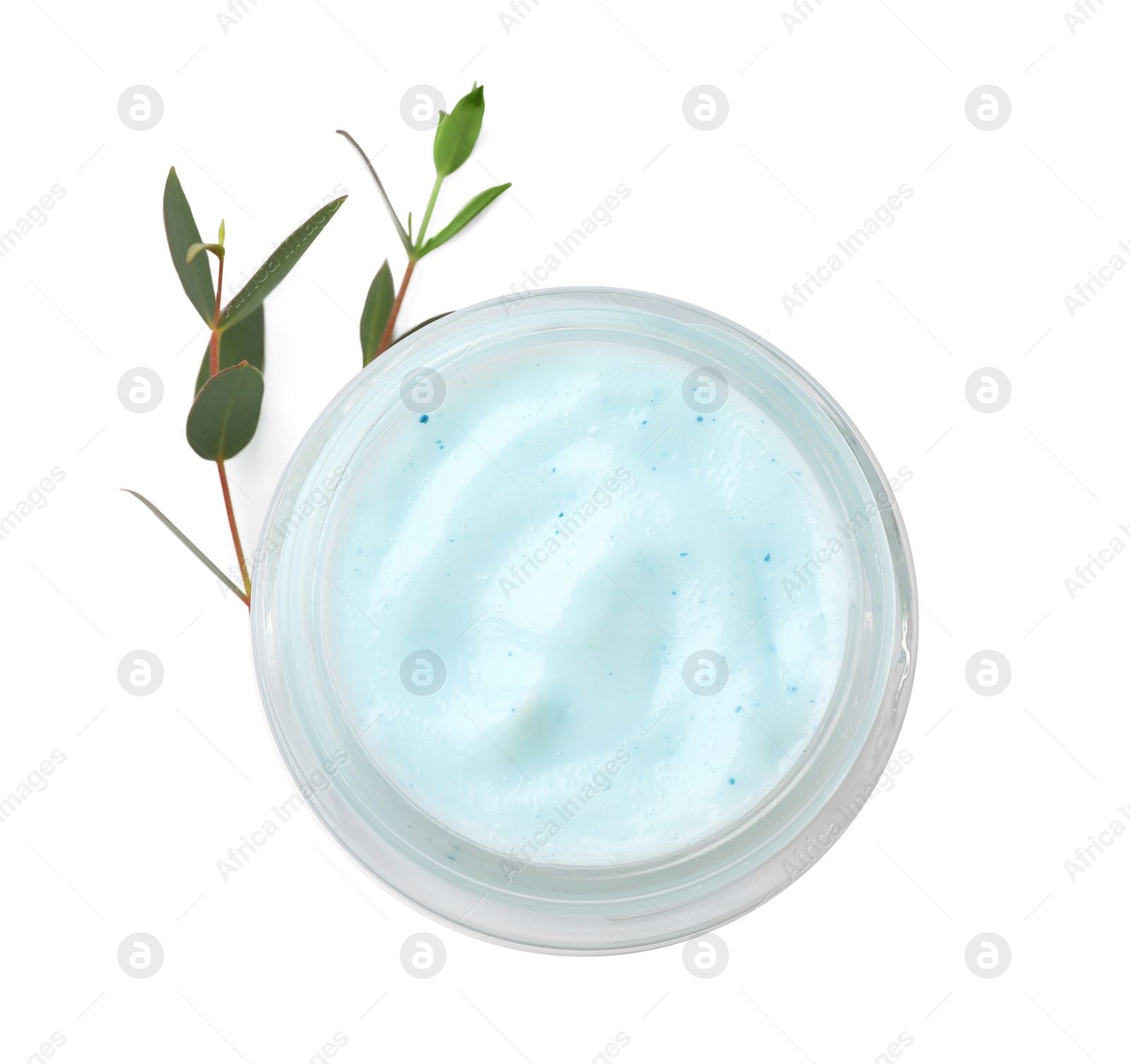 Photo of Jar of body cream with eucalyptus on white background, top view