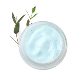 Jar of body cream with eucalyptus on white background, top view