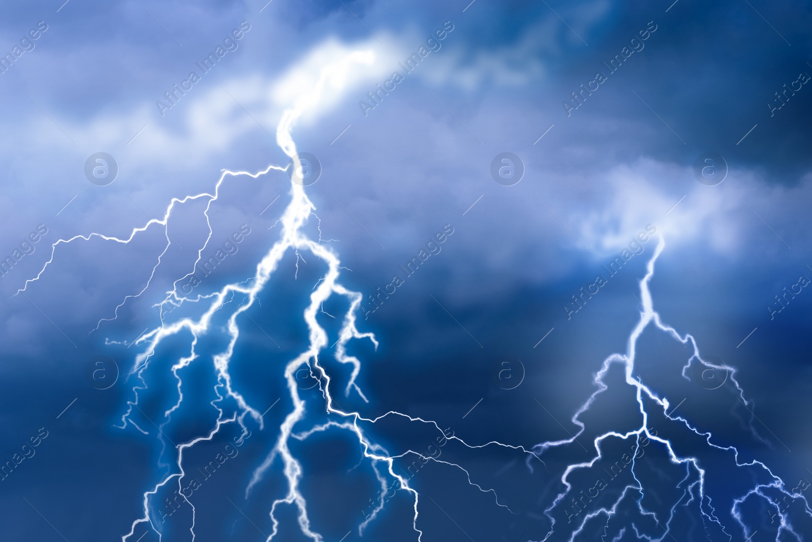 Image of Lightnings in dark cloudy sky during thunderstorm