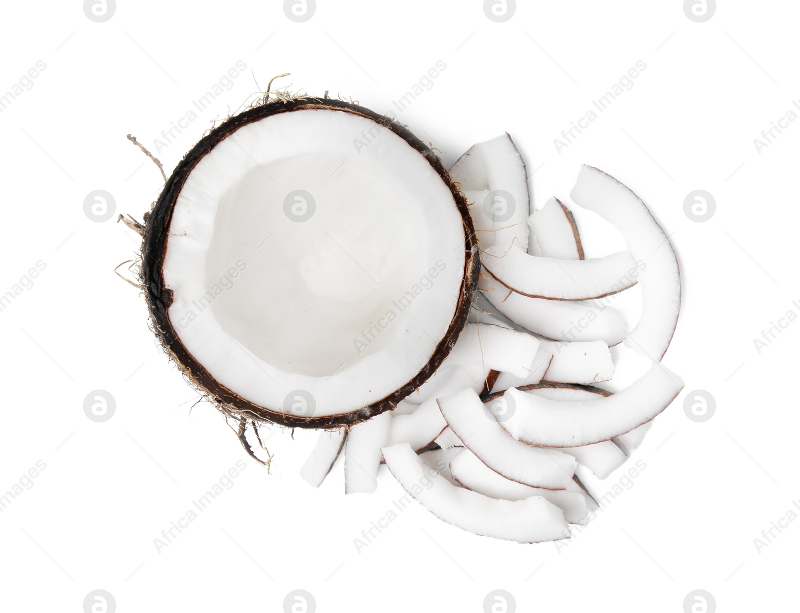 Photo of Pieces of fresh coconut isolated on white, top view