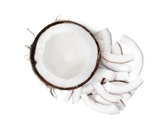 Photo of Pieces of fresh coconut isolated on white, top view