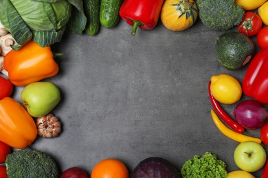 Variety of fresh delicious vegetables and fruits on table, flat lay. Space for text