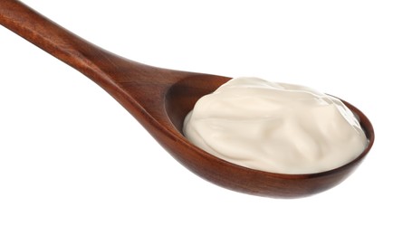 Wooden spoon with tasty mayonnaise isolated on white