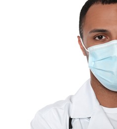 Doctor or medical assistant (male nurse) with protective mask on white background, closeup