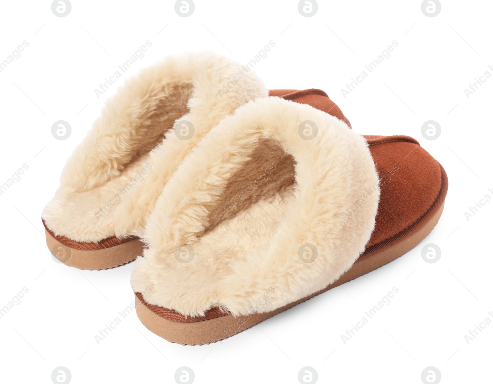 Photo of Pair of soft slippers with fur isolated on white