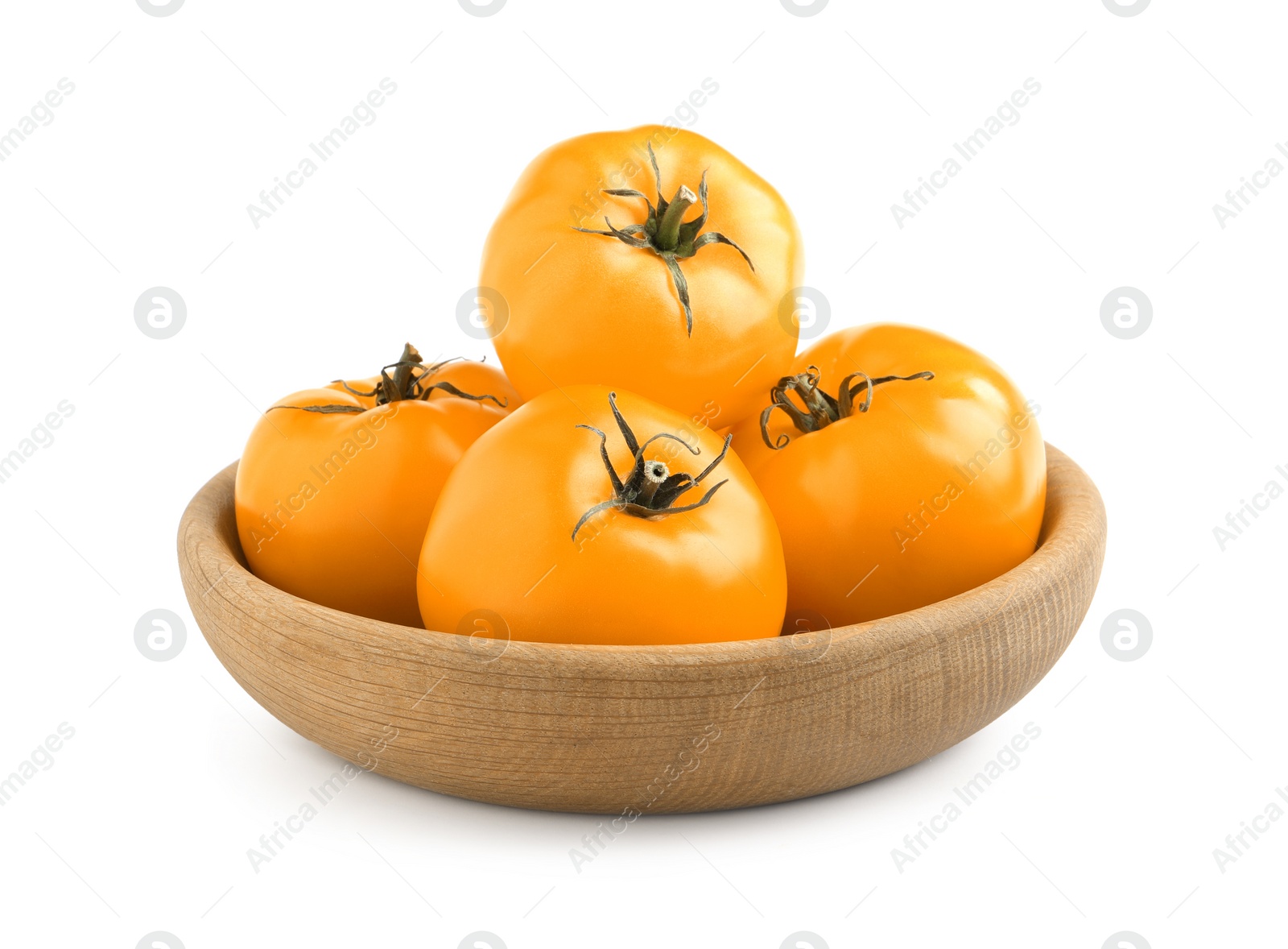 Photo of Wooden bowl of fresh ripe yellow tomatoes isolated on white