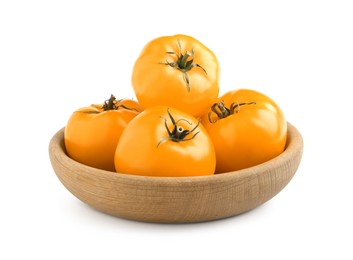 Wooden bowl of fresh ripe yellow tomatoes isolated on white