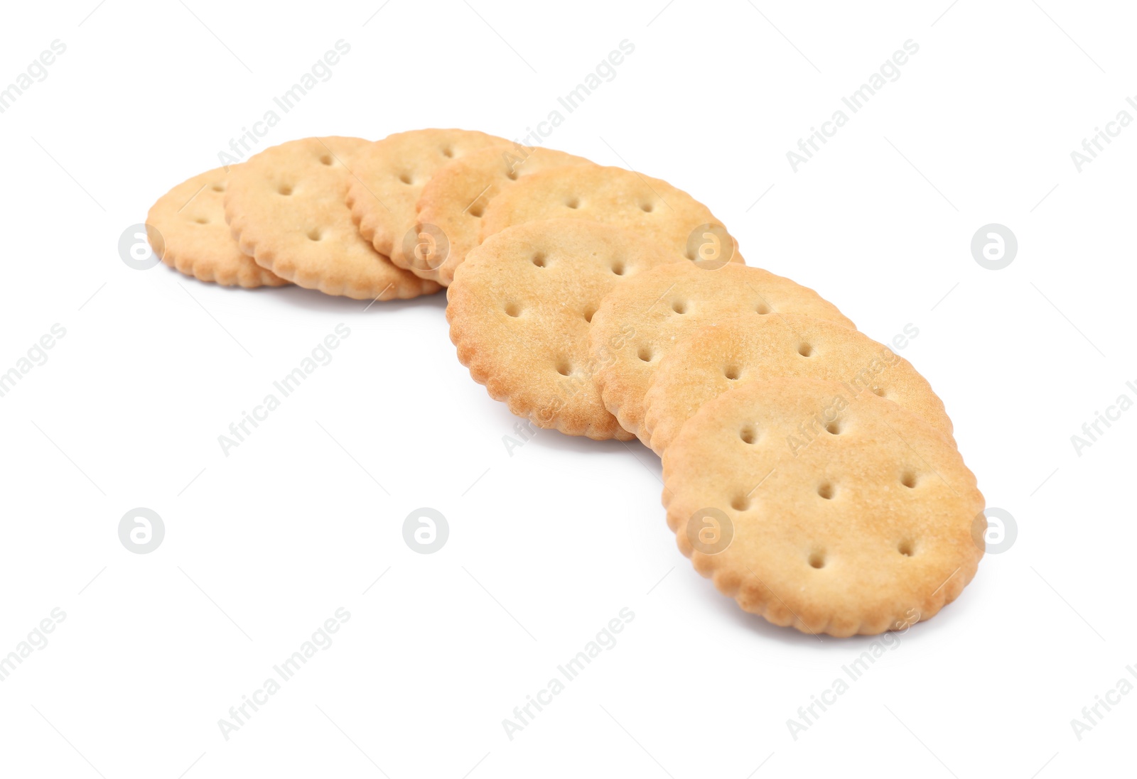 Photo of Tasty crispy round crackers isolated on white