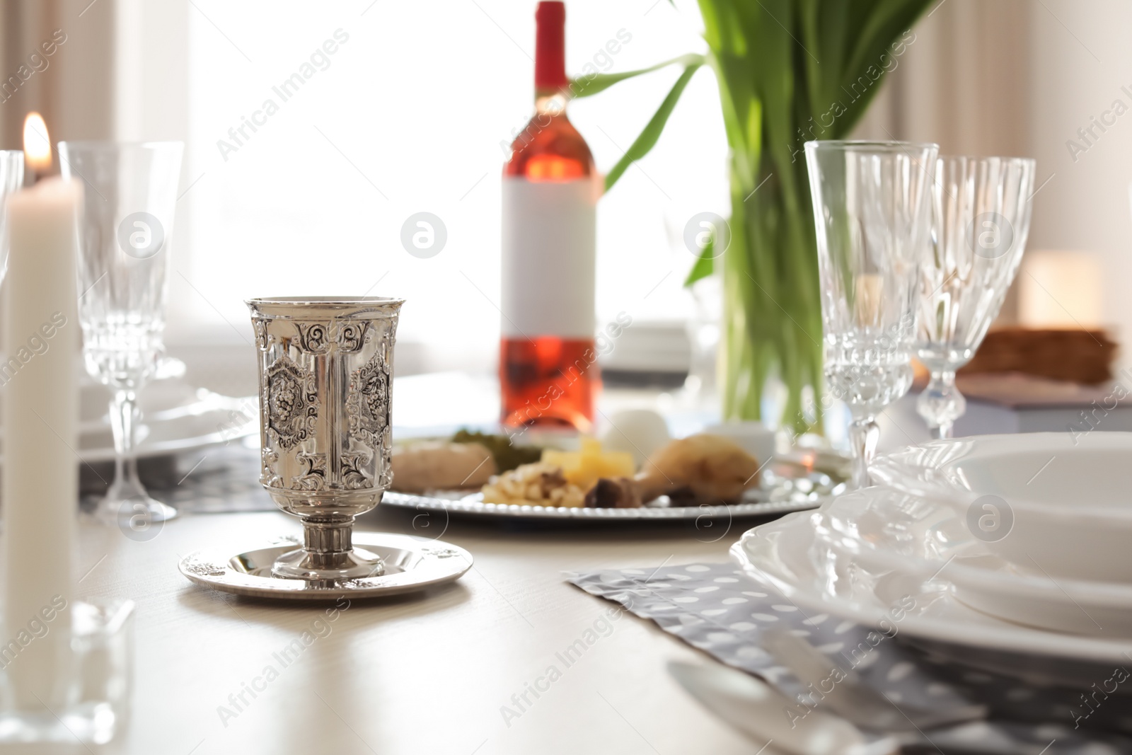 Photo of Table served for Passover (Pesach) Seder indoors