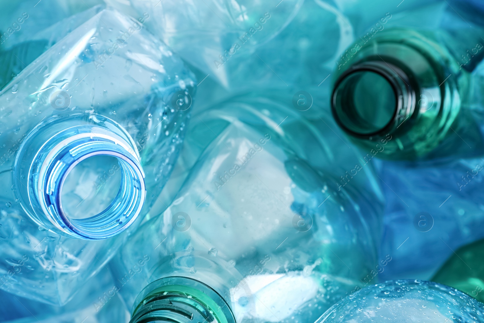 Photo of Many plastic bottles as background, closeup. Recycle concept