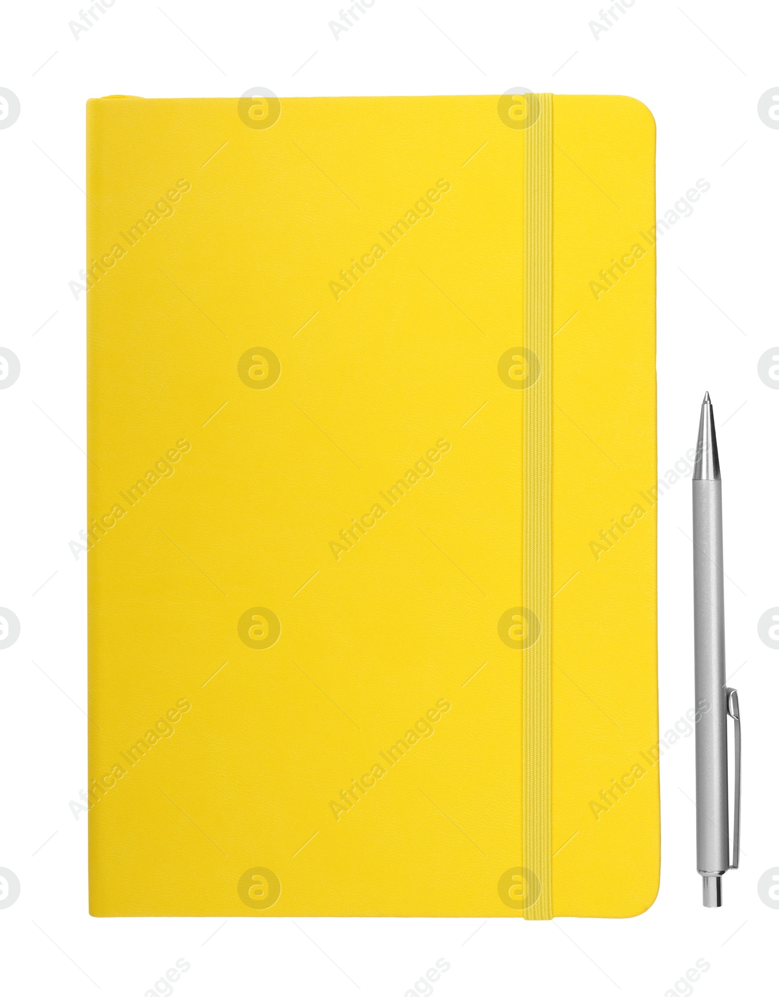 Photo of Closed yellow notebook with pen isolated on white, top view