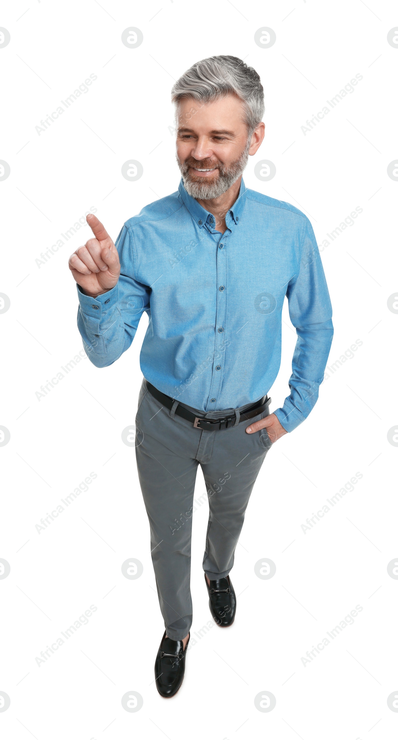 Photo of Mature businessman in stylish clothes posing on white background