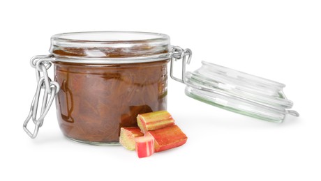 Jar of tasty rhubarb jam and cut stems on white background