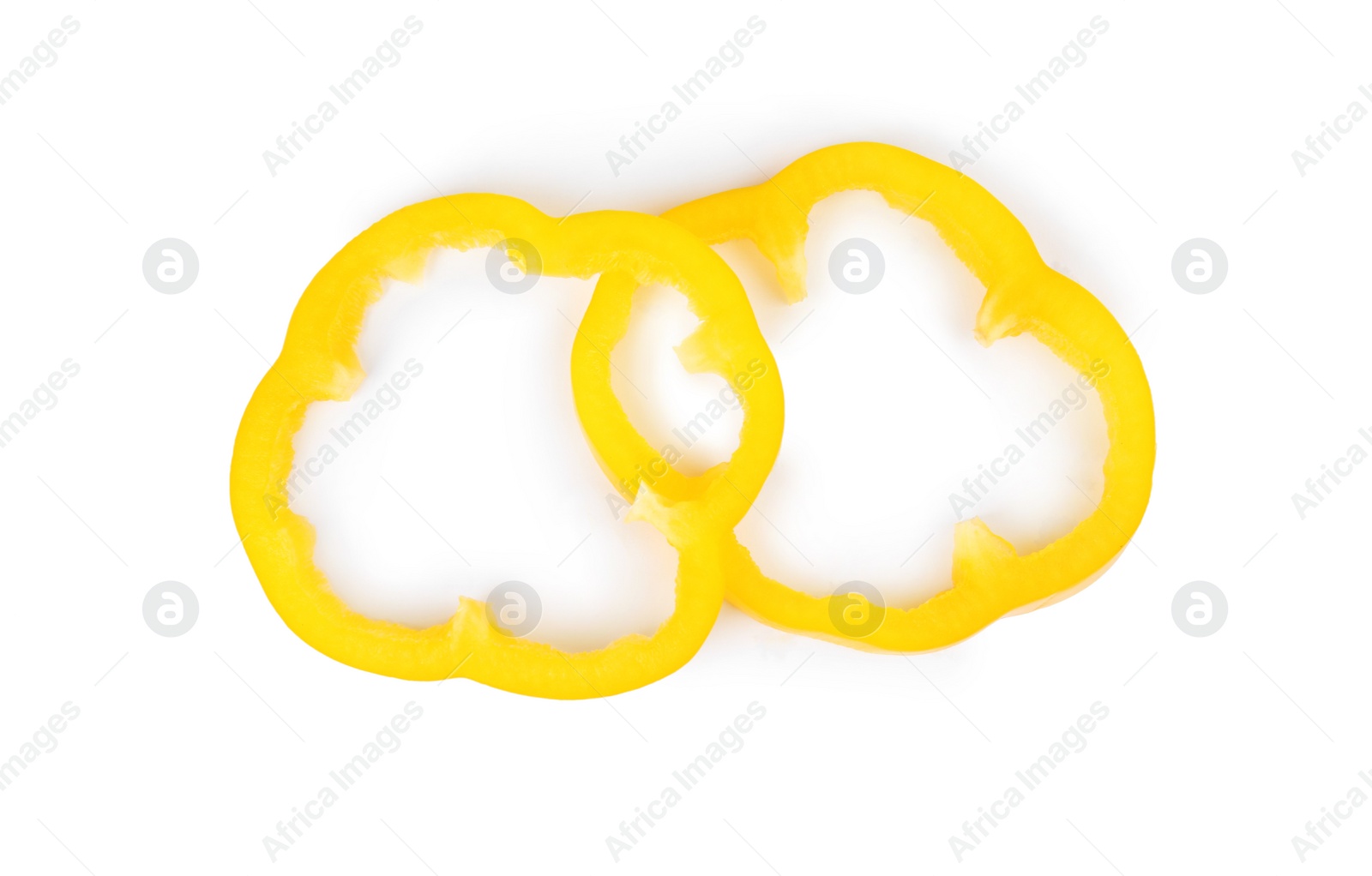 Photo of Rings of yellow bell pepper isolated on white, top view