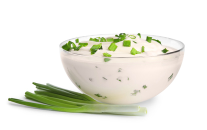 Photo of Fresh sour cream with onion on white background