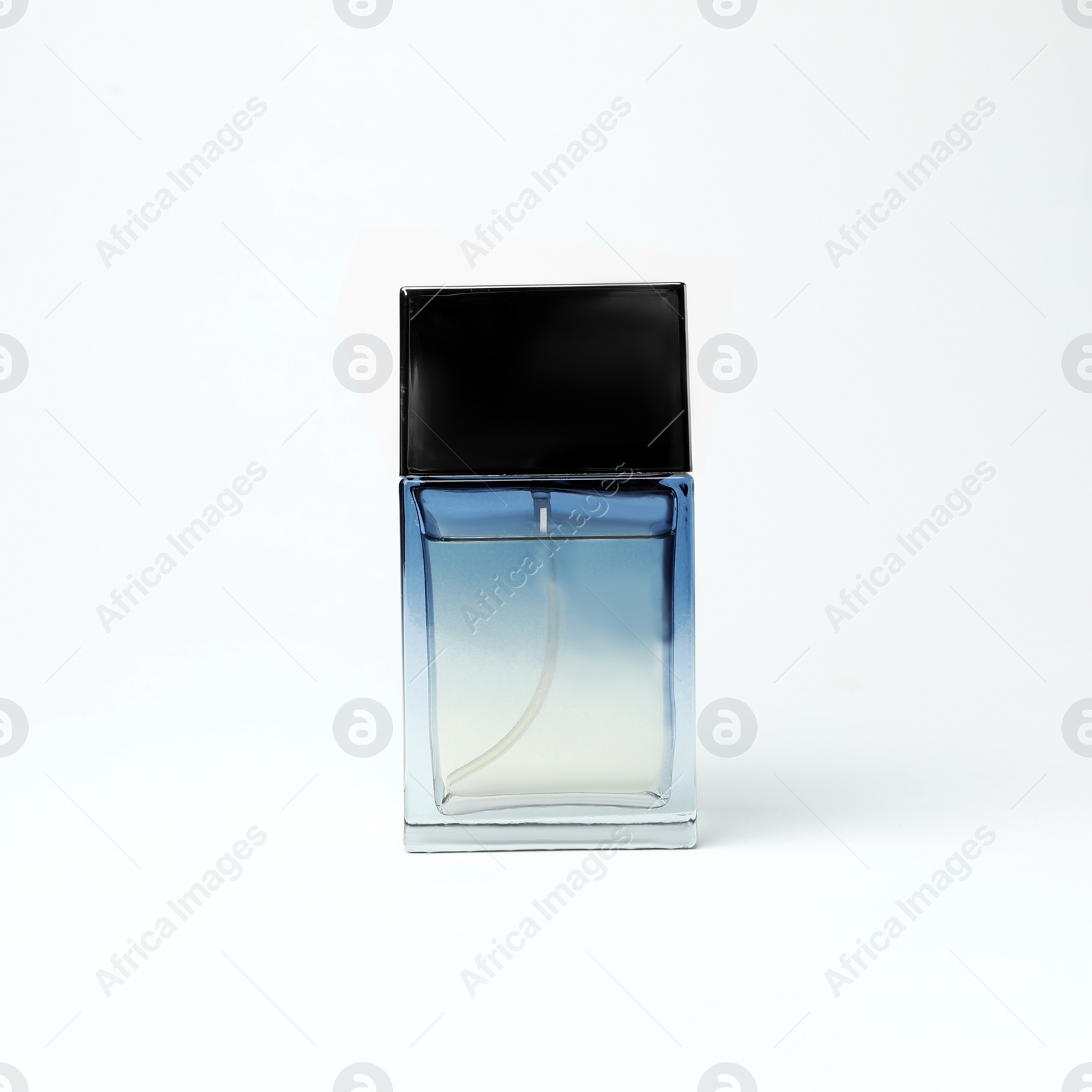 Photo of Transparent bottle of perfume on white background