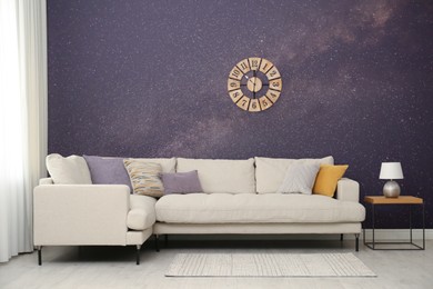 Image of Amazing night starry sky as wallpaper pattern. Living room interior with comfortable sofa near wall