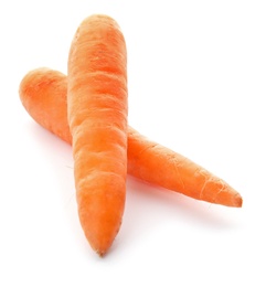 Photo of Ripe fresh carrots on white background