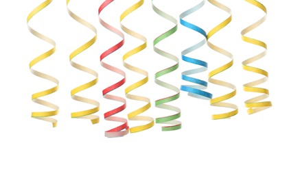 Colorful serpentine streamers on white background. Festive decor