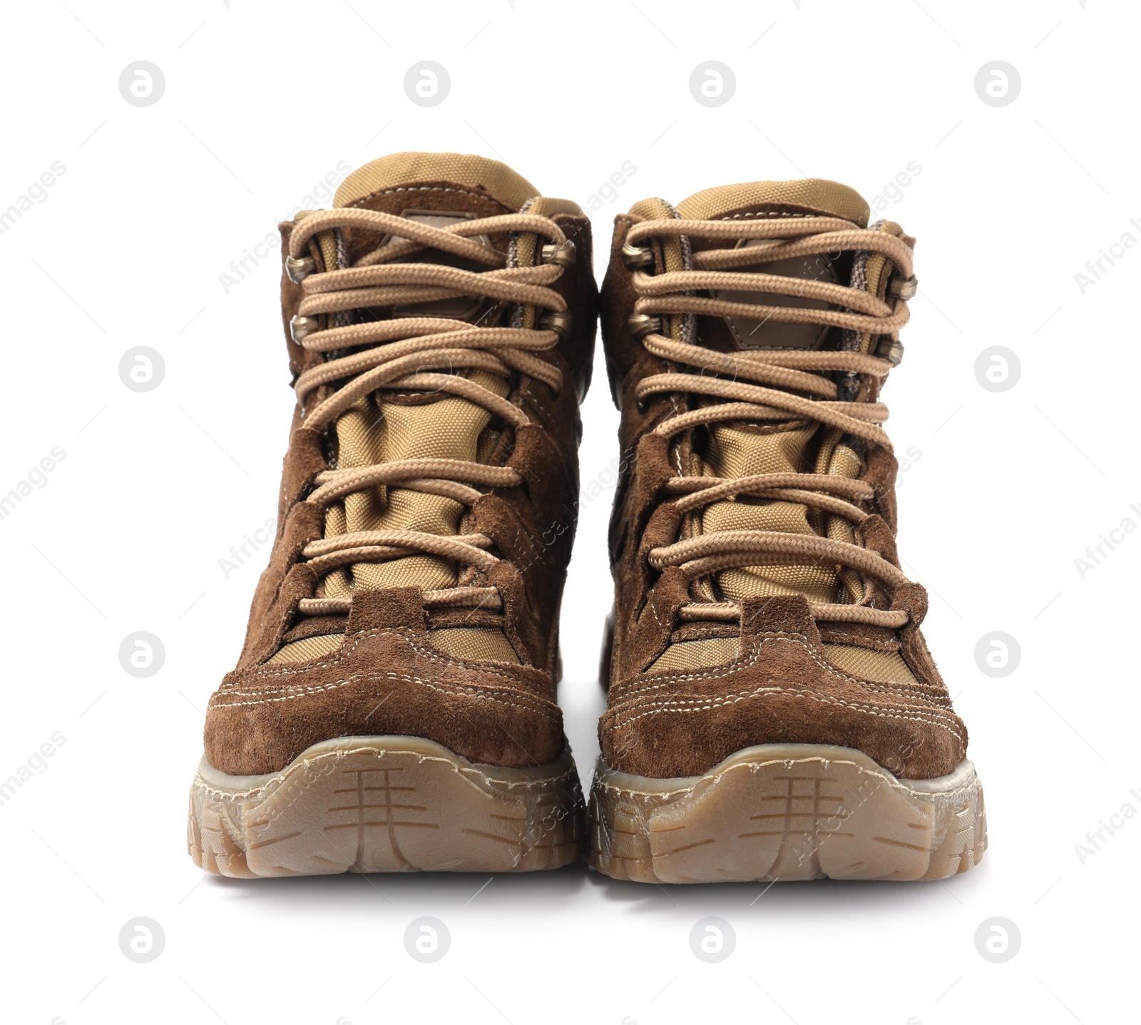 Photo of Pair of comfortable hiking boots on white background. Camping tourism