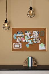 Photo of Stylish room interior with vision board and decor elements