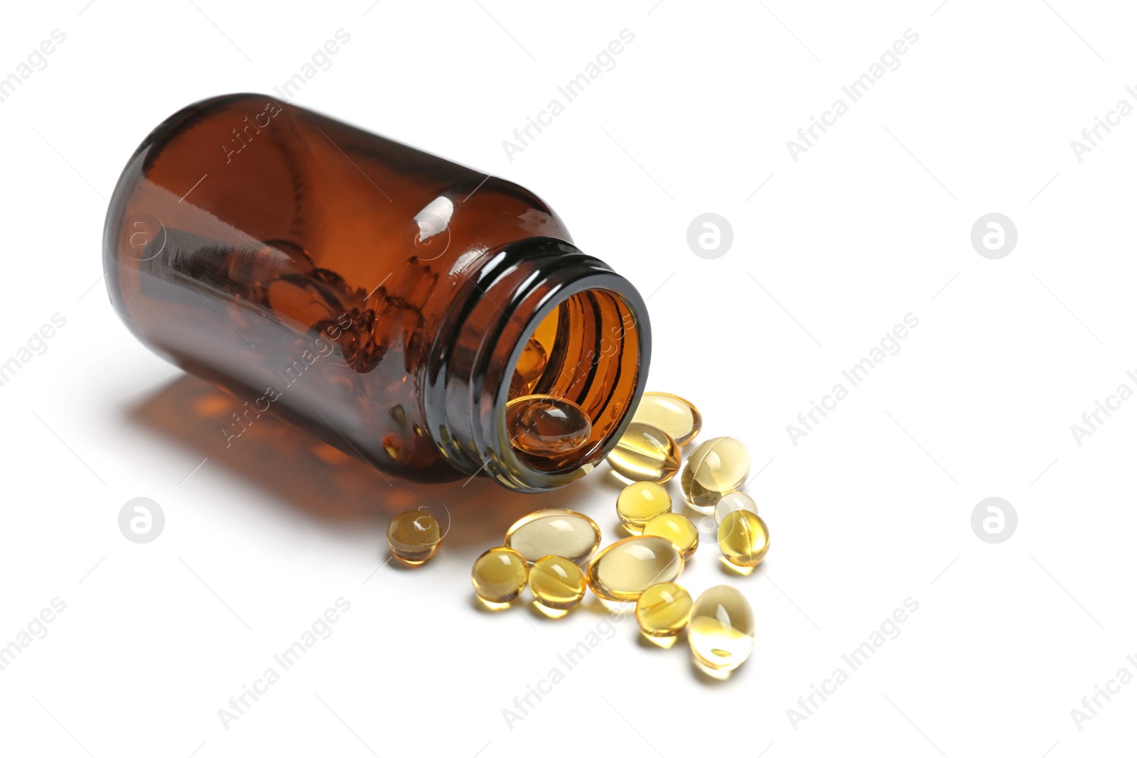 Photo of Bottle with cod liver oil capsules on white background