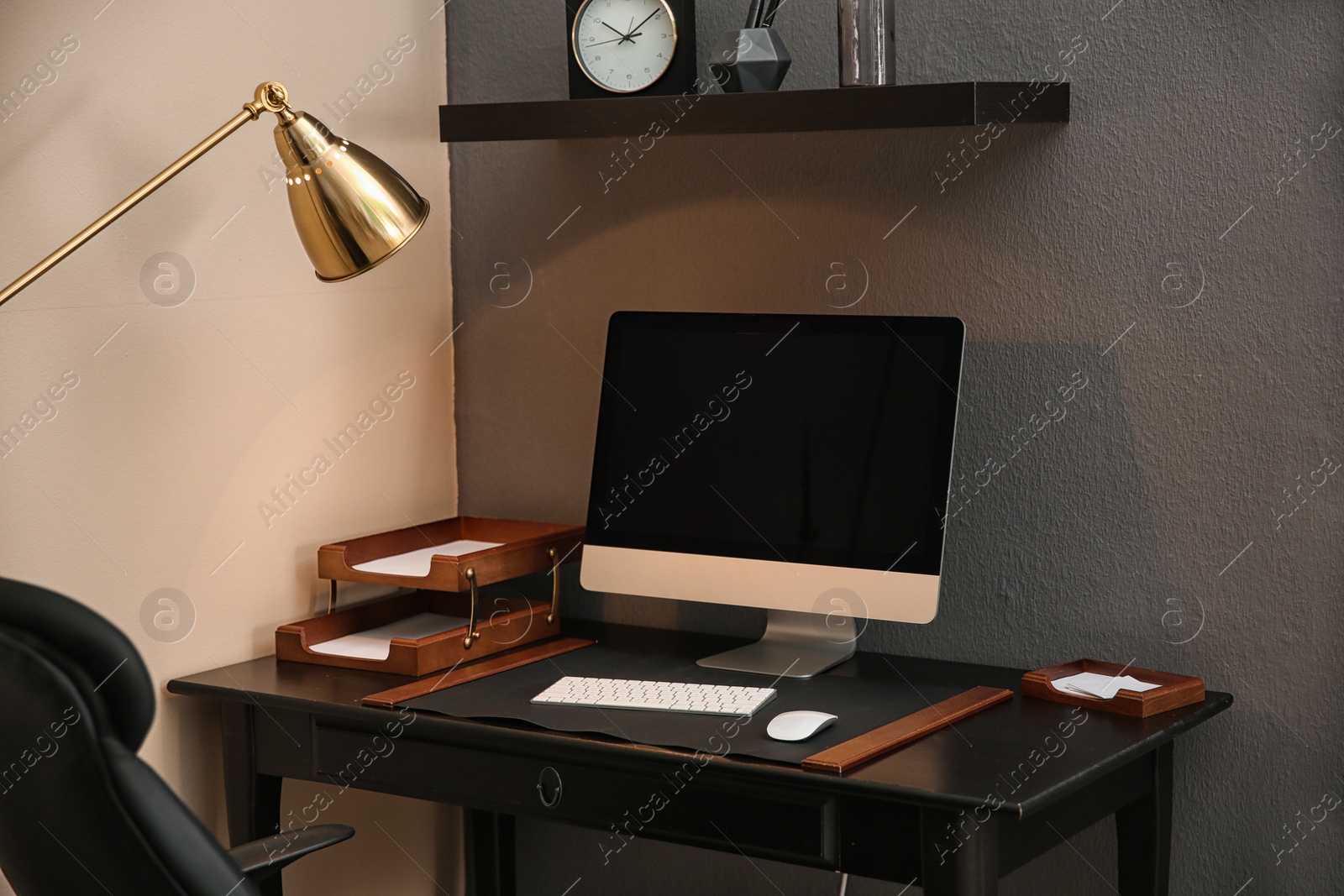 Photo of Modern interior of working place with computer