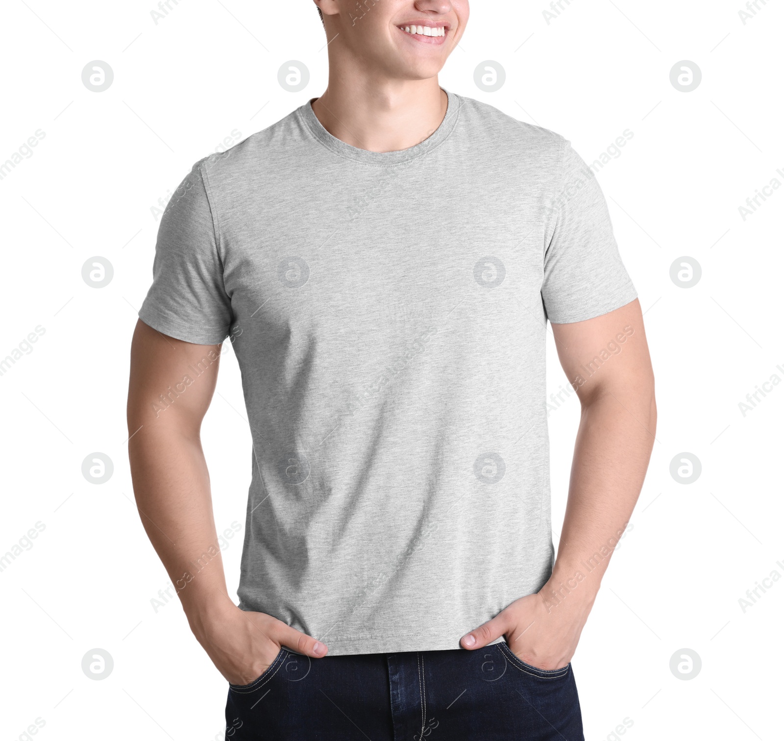 Photo of Young man in grey t-shirt on white background. Mockup for design