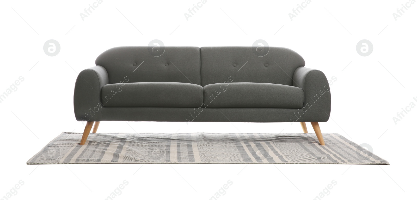 Photo of Comfortable grey sofa and carpet on white background. Furniture for living room interior