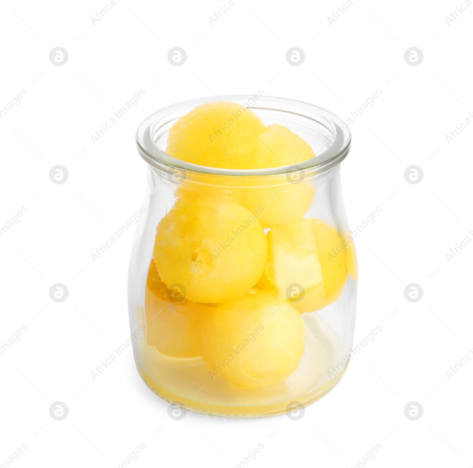 Photo of Glass jar of melon balls on white background