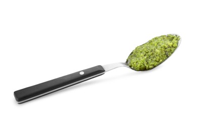 Photo of Spoon with delicious pesto sauce isolated on white