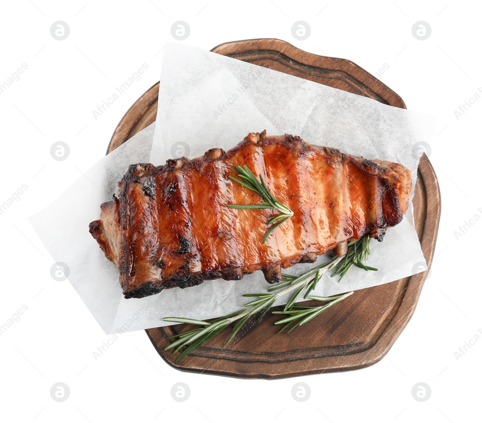 Photo of Tasty grilled ribs with rosemary isolated on white, top view