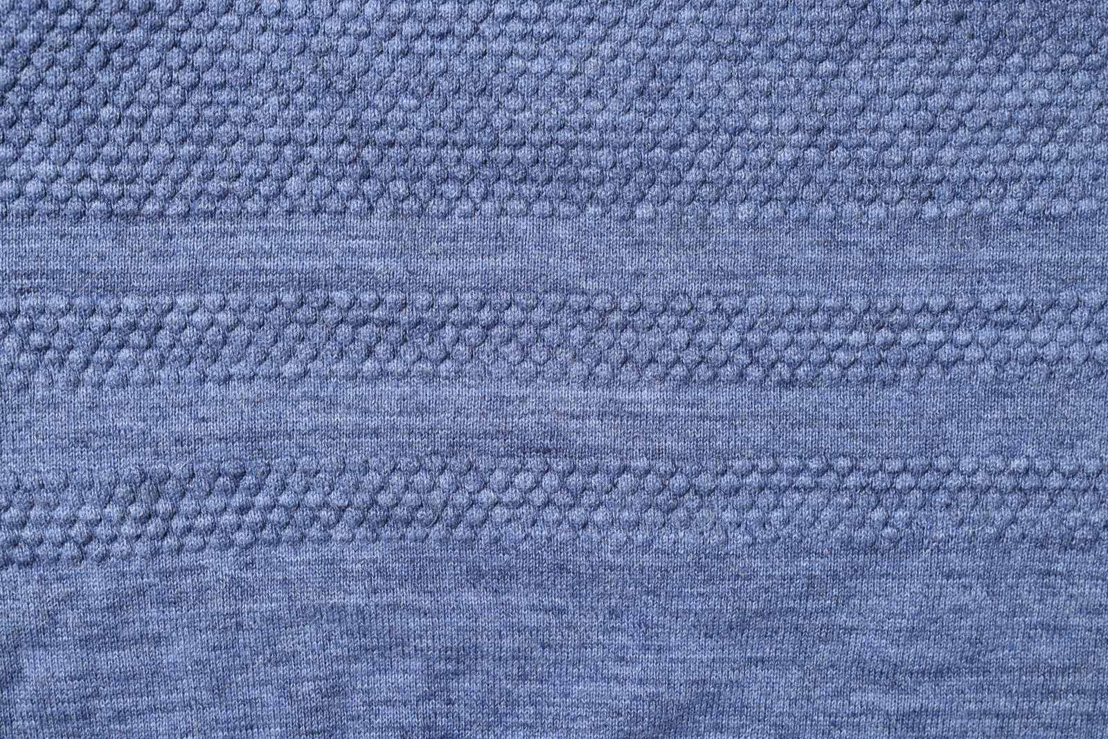 Photo of Texture of soft blue fabric as background, top view