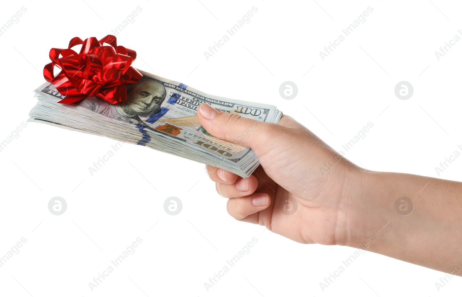 Photo of Woman holding dollar banknotes with bow on white background, closeup