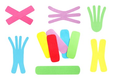 Image of Set with different color kinesio tapes on white background