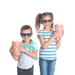 Photo of Cute children with popcorn and glasses on white background