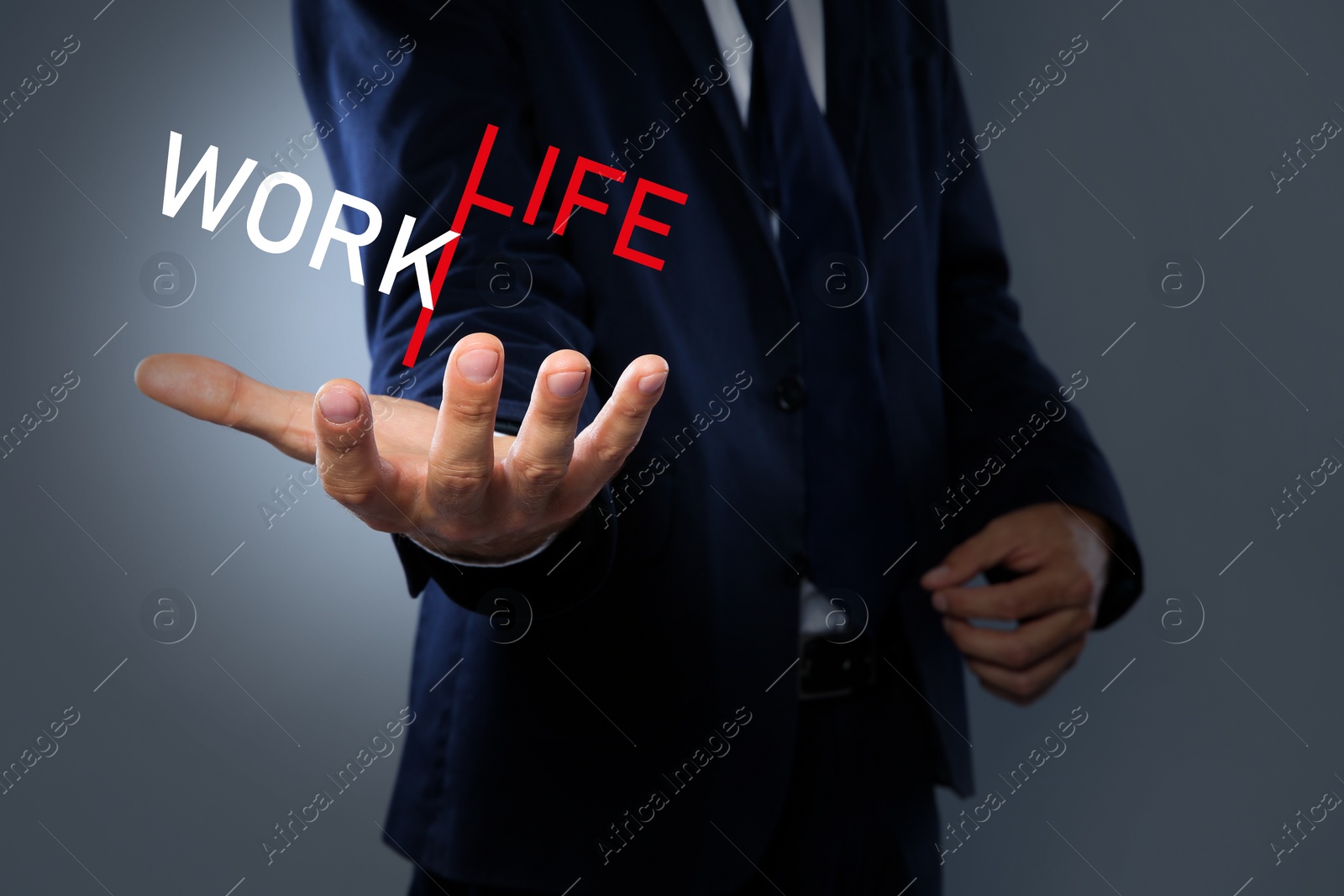 Image of Businessman showing balance between life and work on grey background, closeup