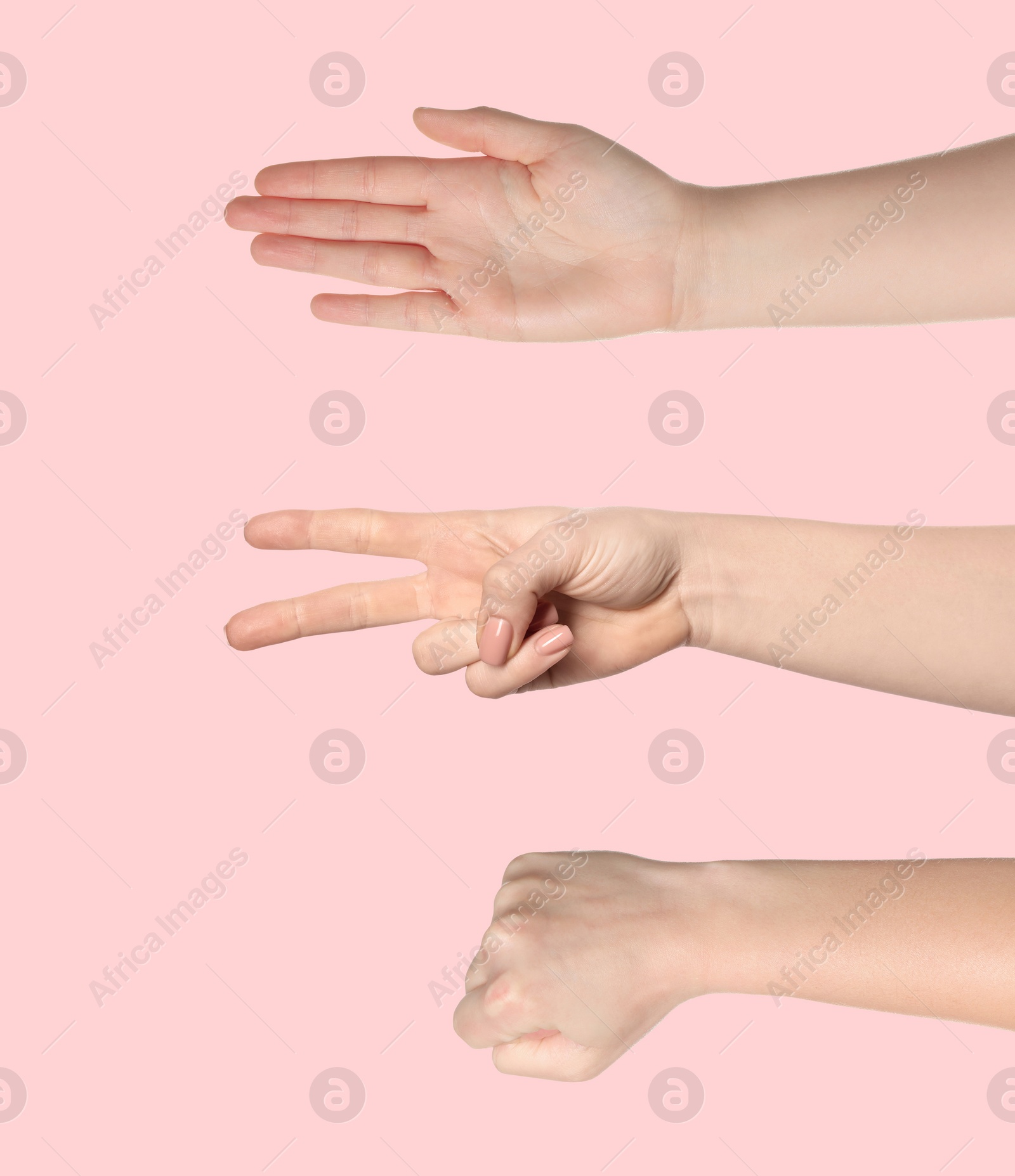 Image of People playing rock, paper and scissors on pink background, closeup