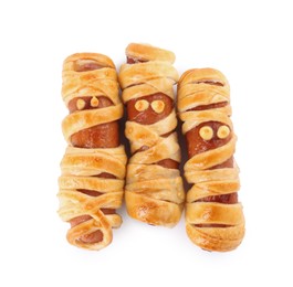 Cute sausage mummies isolated on white, top view. Halloween party food