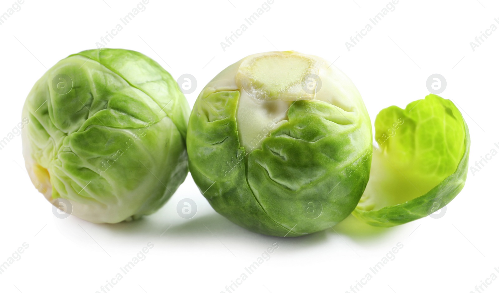 Photo of Fresh tasty Brussels sprouts on white background