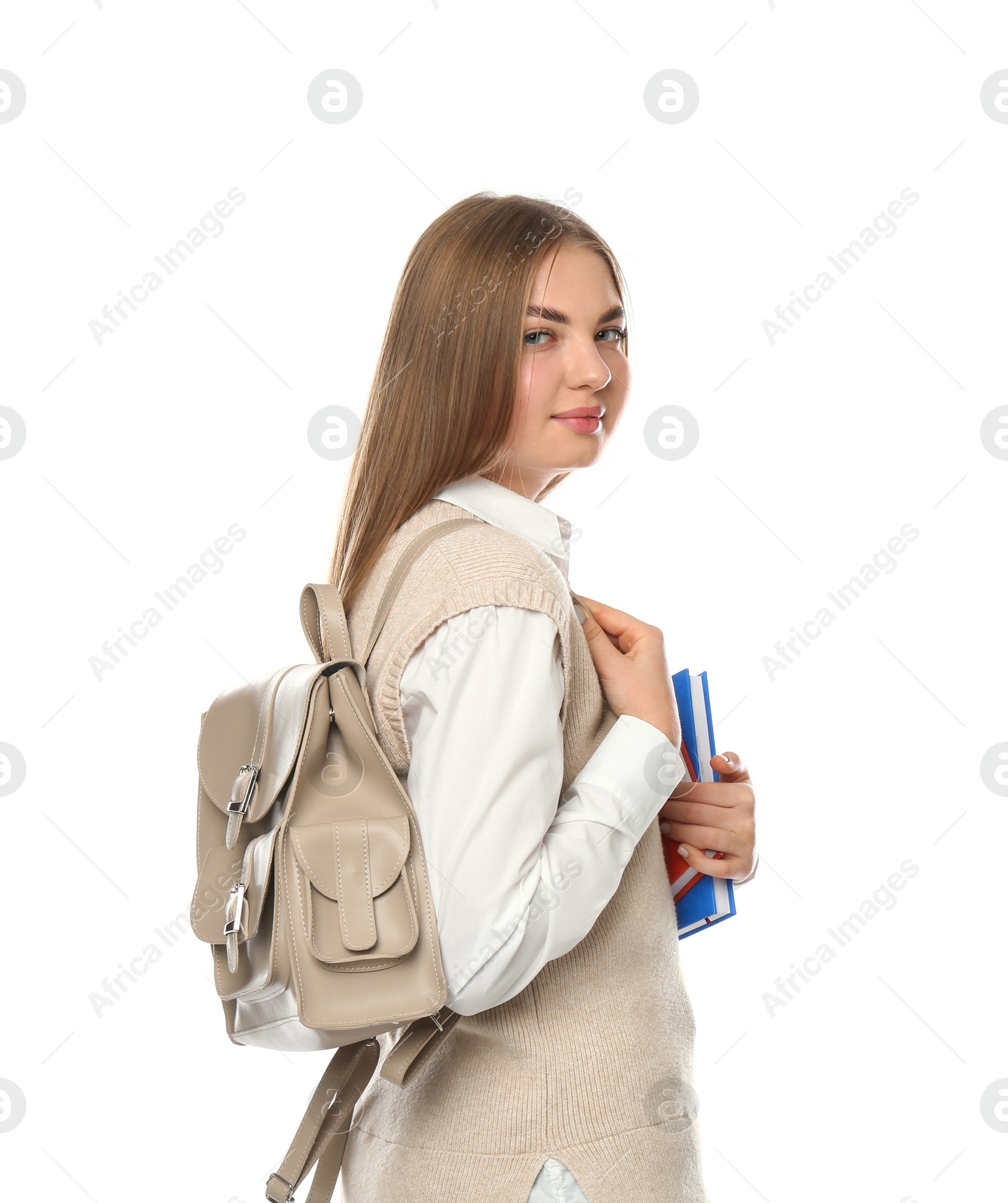 Photo of Teenage student with backpack and books on white background