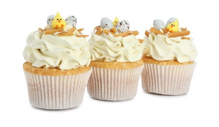 Tasty Easter cupcakes with vanilla cream isolated on white