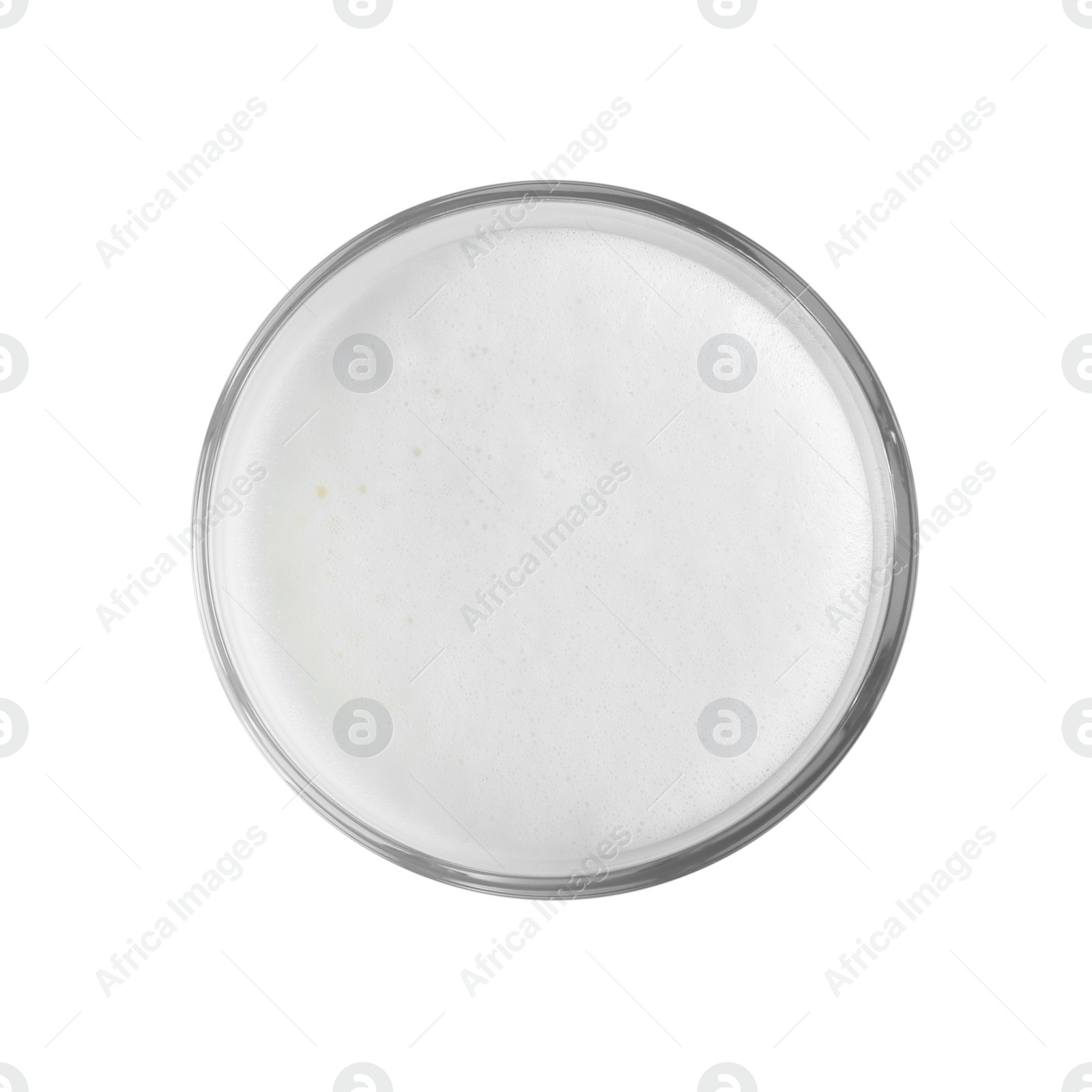 Photo of Glass of fresh milk isolated on white, top view